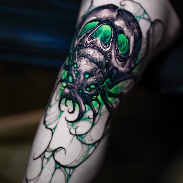 Photo by Christian Boye Larsen on May 21, 2026. May be an image of one or more people, tattoo, beetle, spider, skull and text.